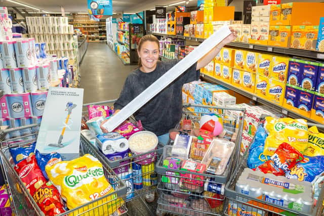 Gillian Currie raised a record total of £1,119.39 for CHAS as part of Aldi Scotland's Supermarket Sweep.