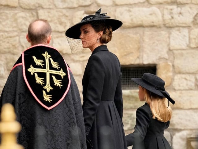 LONDON, ENGLAND - SEPTEMBER 19: Catherine, Princess of Wales and Princess Charlotte of Wales arrive at Westminster Abbey for The State Funeral of Queen Elizabeth II on September 19, 2022 in London, England. Elizabeth Alexandra Mary Windsor was born in Bruton Street, Mayfair, London on 21 April 1926. She married Prince Philip in 1947 and ascended the throne of the United Kingdom and Commonwealth on 6 February 1952 after the death of her Father, King George VI. Queen Elizabeth II died at Balmoral Castle in Scotland on September 8, 2022, and is succeeded by her eldest son, King Charles III. (Photo by Christopher Furlong/Getty Images)