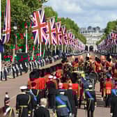 The Queen’s funeral cortege makes its way along The Mall from Buckingham Palace  during the procession for the Lying-in State of Queen Elizabeth II on September 14, 2022.