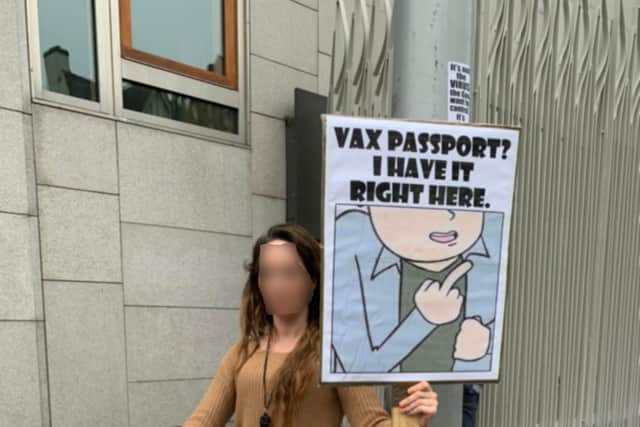 A protester outside the Holyrood building