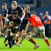 Edinburgh's Bill Mata tries to find a way through against Munster. Picture: Bruce White/SNS