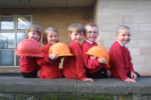 Local kids with hard hats.