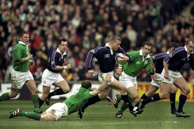Glenn Metcalfe embarks on a run during Scotland's Five Nations win over Ireland at Murrayfield in 1999. Pic: Jamie McDonald /Allsport