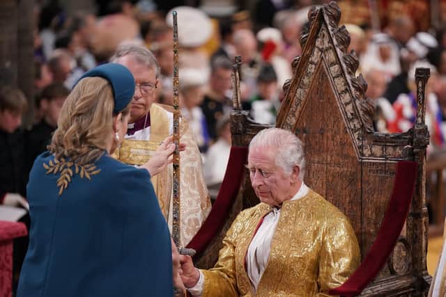 Lord President of the Council, Penny Mordaunt, presenting the Sword of State, to King Charles III during his coronation ceremony in Westminster Abbey. Picture: Victoria Jones/PA Wire