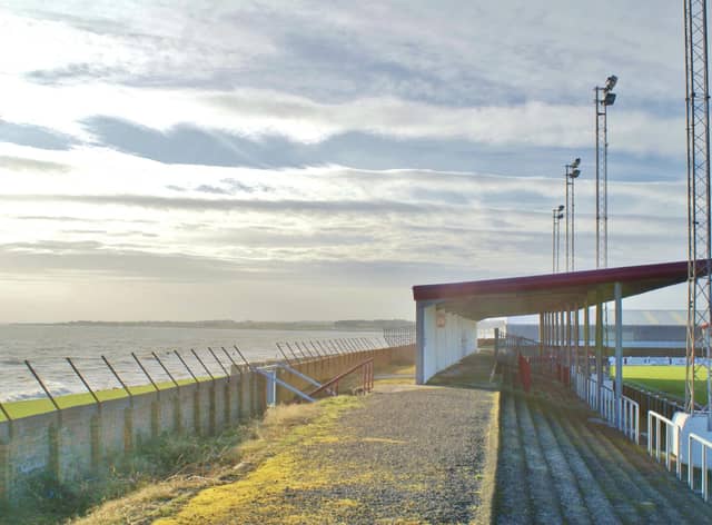 Unsuspecting wingers can find themselves soaked by a freak wave from the North Sea at Arbroath FC's Gayfield Park (Picture: Laurence Reade)