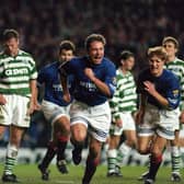 Ally McCoist celebrates scoring Rangers' second goal in the epic 3-3 draw against Celtic at Ibrox on November 19, 1995.
