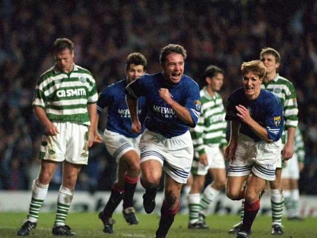 Ally McCoist celebrates scoring Rangers' second goal in the epic 3-3 draw against Celtic at Ibrox on November 19, 1995.