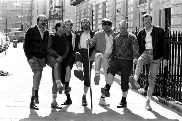 It's 1986 and pop stars Chas 'n' Dave enjoy a knees up with snooker's 'match room mob' to announce the release of their new song 'Snooker Loopy'. The mob are (from left) Willie Thorne, Tony Meo, Terry Griffiths, Dennis Taylor and Steve Davis.