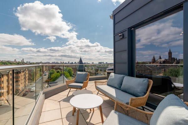 Exterior: There is a secure video entry system to all apartments and a hidden private courtyard for residents. The roof terrace has west-facing views, meaning it is well lit later in the day.