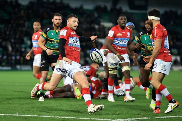 Finn Russell of Racing 92 kicks the ball upfield during the Heineken Champions Cup win over Northampton Saints (Photo by David Rogers/Getty Images)
