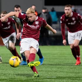 Nicky Low converts Arbroath's winner from the penalty spot.