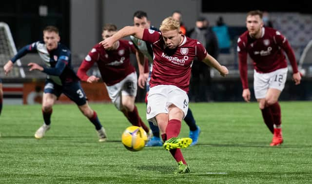 Nicky Low converts Arbroath's winner from the penalty spot.