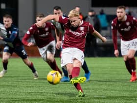 Nicky Low converts Arbroath's winner from the penalty spot.