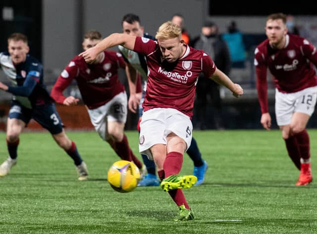 Nicky Low converts Arbroath's winner from the penalty spot.
