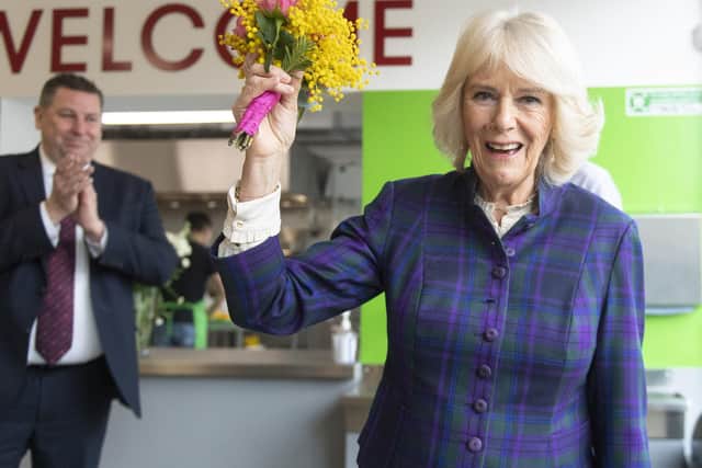 The Duchess of Cornwall is presented with flowers at the end of her visit to  the UKHarvest charity's West London 'Nourish Hub' . Picture: Geoff Pugh/Daily Telegraph/PA Wire