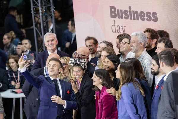 President Emmanuel Macron with young French tech entrepreneurs at the Summit for Action on Artificial Intelligence AI this week (Picture: Getty)