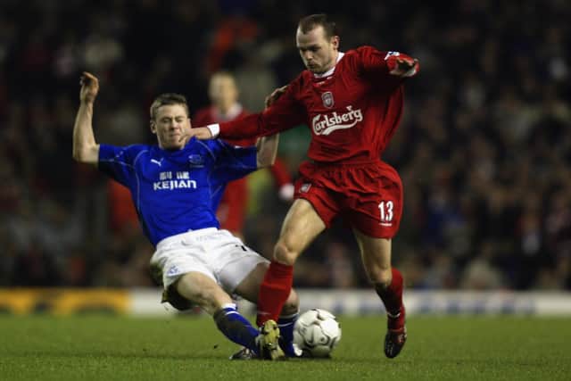 Gary Naysmith, who played for Everton between 2000 and 2007, challenges Liverpool's Danny Murphy during a Merseyside derby match in December 2002. (Photo Michael Steele/Getty Images)