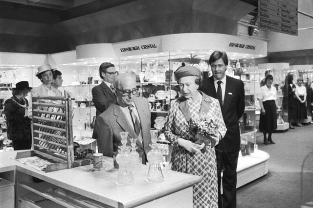 Queen Elizabeth II can be seen here chatting with Fred Lonie at the Edinburgh crystal department of Jenners as she visits the 150th anniversary exhibition. Year: 1988
