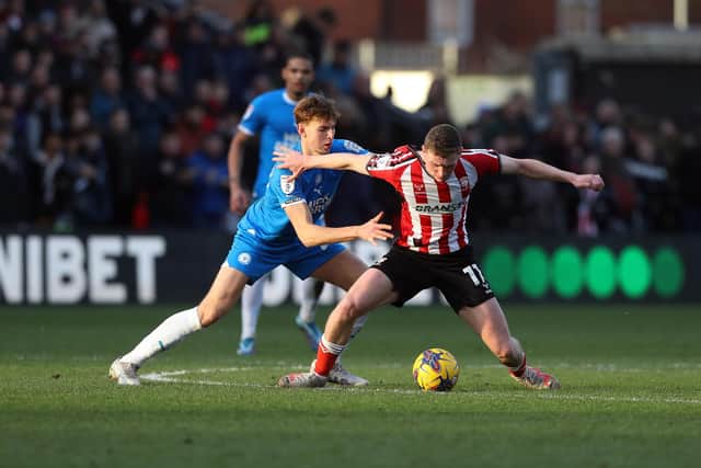 Ethan Hamilton has joined Dundee for an undisclosed fee.