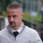 Ex-Celtic striker Leigh Griffiths leaves Dundee Sheriff Court after he was fined for kicking a pyrotechnic device into a crowd. Pic: Andrew Milligan/PA Wire