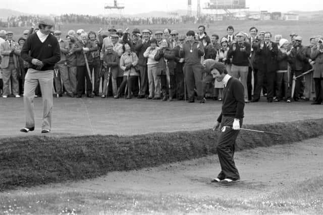 Ian Hutcheon smiles at Mike Kelly after he had holed a bunker shot during the 1979 Walker Cup at Muirfield. Picture: TSPL