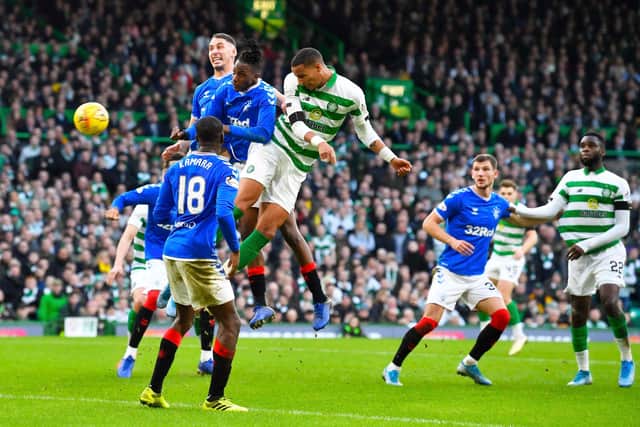 Celtic's Christopher Jullien goes close during the the Glasgow clubs' last meeting in December 2019, before Covid-19 prevented supporters entering stadiums as will be the case when the pair lock horns on Saturday (Photo by Rob Casey / SNS Group)