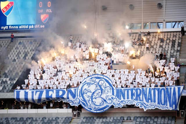 FC Luzern supporters cheer their team on during the 2-1 victory over Djurgarden IF in Sweden.