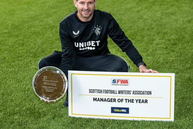 Steven Gerrard with the William Hill Scottish Football Writers' Association Manager of the Year award. (Photo by Kirk O'Rourke).