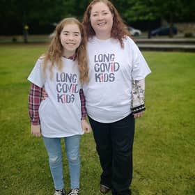 Tracy McMullen and daughter Eva, whose brother Jonathan is bedbound with long covid