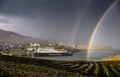 MV Hebrides docks at Tarbert, Harris, Outer Hebrides with rainbows
