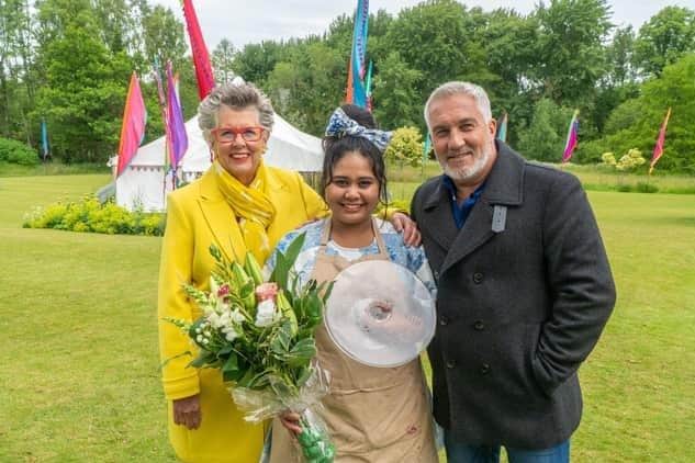Great British Bake Off 2022 winner Syabira Yusoff with judges Paul Hollywood and Prue Leith. Image: Mark Bourdillon/Love Productions/Channel 4