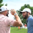 Jon Rahm and Scottie Scheffler talk during a practice round prior to the 2024 PGA Championship at Valhalla Golf Club in Louisville, Kentucky. Picture: Ross Kinnaird/Getty Images.