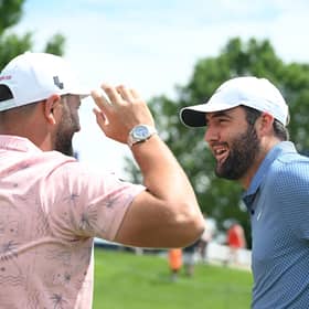 Jon Rahm and Scottie Scheffler talk during a practice round prior to the 2024 PGA Championship at Valhalla Golf Club in Louisville, Kentucky. Picture: Ross Kinnaird/Getty Images.