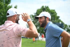 Jon Rahm and Scottie Scheffler talk during a practice round prior to the 2024 PGA Championship at Valhalla Golf Club in Louisville, Kentucky. Picture: Ross Kinnaird/Getty Images.