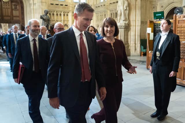 Chancellor of the Exchequer Rachel Reeves and Shadow chancellor Jeremy Hunt walk through the Member's Lobby of the Houses of Parliament in London after hearing the King's Speech during the State Opening of Parliament. PIC: Stefan Rousseau/PA Wire