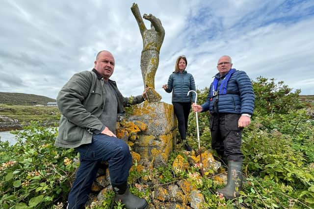 Saint Barr Statue Fundraising Group members Micheal MacKinnon, Theresa Irving and Michael MacNeil at the statue