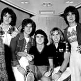 Bay City Rollers guitarist Stuart 'Woody' Wood, pictured left with bandmates, said his father had died from Coronavirus.