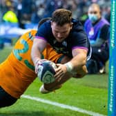 An airborne Ewan Ashman scores Scotland’s second half try in the 15-13 win over Australia. (Photo by Ross Parker / SNS Group)