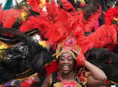 Performers parade along Princes Street in Edinburgh in the Edinburgh Festival Carnival. Performers from more than 13 countries, take part in the event. Picture date: Sunday July 17, 2022.