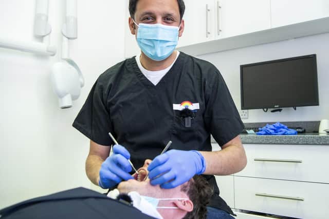 The Scotsman's Westminster correspondent Alexander Brown has his teeth checked by Scottish Labour Leader Anas Sarwar. Picture: Lisa Ferguson