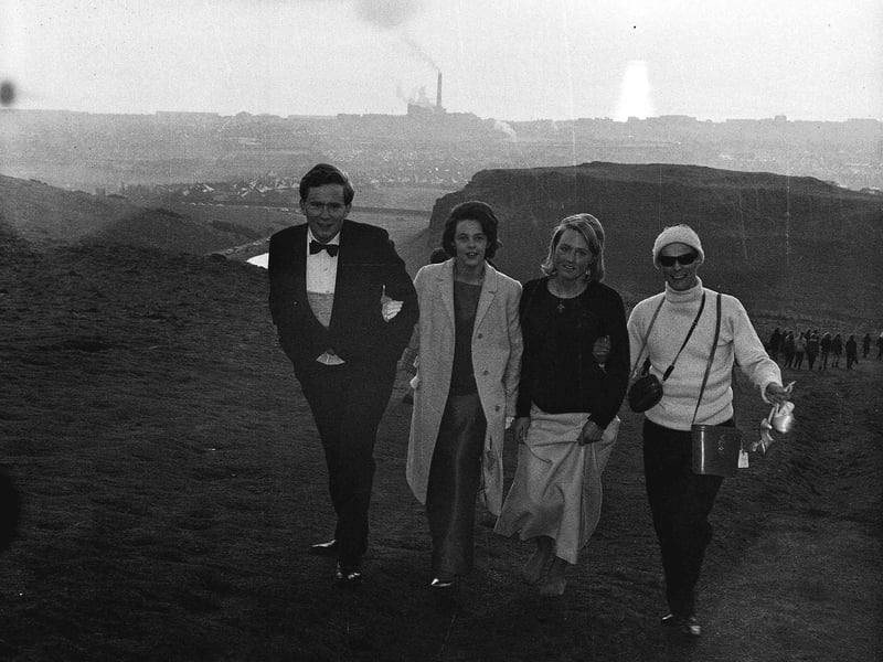 Four students who came straight from the Edinburgh University charities ball to climb Arthur's Seat on May Day 1965.