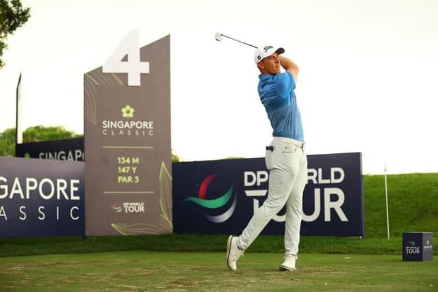 Grant Forrest tees off on the fourth at Laguna National Golf Resort Club. The Scot will return on Saturday morning to complete his second round in the Singapore Classic. Picture: Yong Teck Lim/Getty Images.