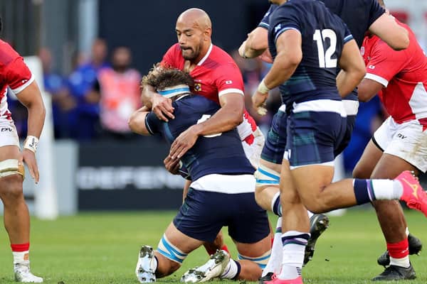 Scotland captain Jamie Ritchie, centre, is on the receiving end of Afusipa Taumoepeau's high tackle during the Rugby World Cup game against Tonga in Nice. Taumoepeau received a yellow card which was not upgraded to red after a Bunker review. (Photo by David Rogers/Getty Images)