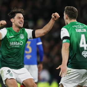 Paul Hanlon and Joe Newell celebrate Hibs' win at Hampden.