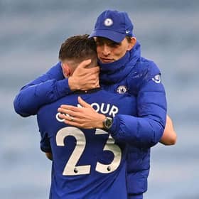 Thomas Tuchel and midfielder Billy Gilmour celebrate after the English Premier League  match between Manchester City and Chelsea at the Etihad Stadium on May 8, 2021. Chelsea won the game 2-1. (Photo by LAURENCE GRIFFITHS/POOL/AFP via Getty Images)