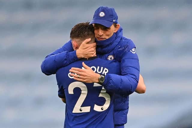 Thomas Tuchel and midfielder Billy Gilmour celebrate after the English Premier League match between Manchester City and Chelsea at the Etihad Stadium on May 8, 2021. Chelsea won the game 2-1. (Photo by LAURENCE GRIFFITHS/POOL/AFP via Getty Images)