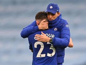 Thomas Tuchel and midfielder Billy Gilmour celebrate after the English Premier League  match between Manchester City and Chelsea at the Etihad Stadium on May 8, 2021. Chelsea won the game 2-1. (Photo by LAURENCE GRIFFITHS/POOL/AFP via Getty Images)