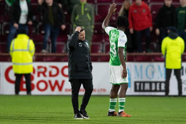 Hibs manager Lee Johnson cuts a dejected figure after the 3-0 defeat to Hearts at Tynecastle. (Photo by Mark Scates / SNS Group)