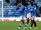 Rangers' James Tavernier (left) and Fashion Sakala appear dejected after the cinch Premiership draw with Livingston at Ibrox.