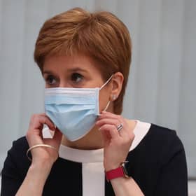 Nicola Sturgeon and health officials have repeatedly stressed the importance of wearing a facemask (Picture: Andrew Milligan/AFP via Getty Images)